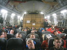 The view from the front of the hold.  There are five rows of five regular airplane seats in the hold on skids for easy removal.  Another twenty or so of us sat on the cargo seating along the side bulkheads.