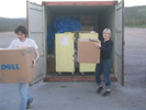 Gaelen and Marie truck boxes into the high-bay for packing.