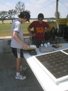Gaelen and Marco test solar arrays.