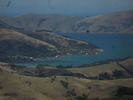 Takamatua on Akaroa harbour from the Summit Road.  Akaroa itself is just on the other side of the slope.