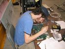 Gaelen modifies one of the ADC boards.
